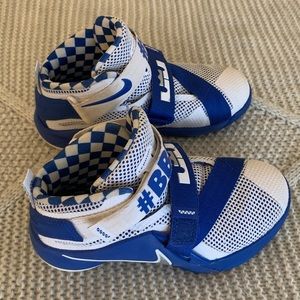 Lebron UK Nike kids blue and white high tops 11c